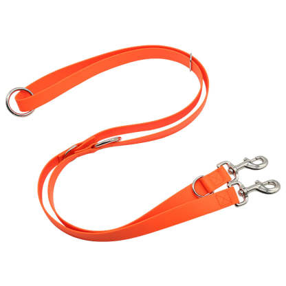 Orange dog leash with metal clips on a white background