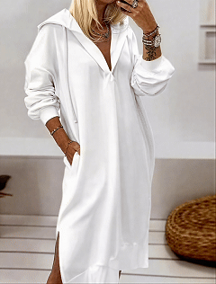 Women's long-sleeved pullover hoodie dress with solid color and side slits.