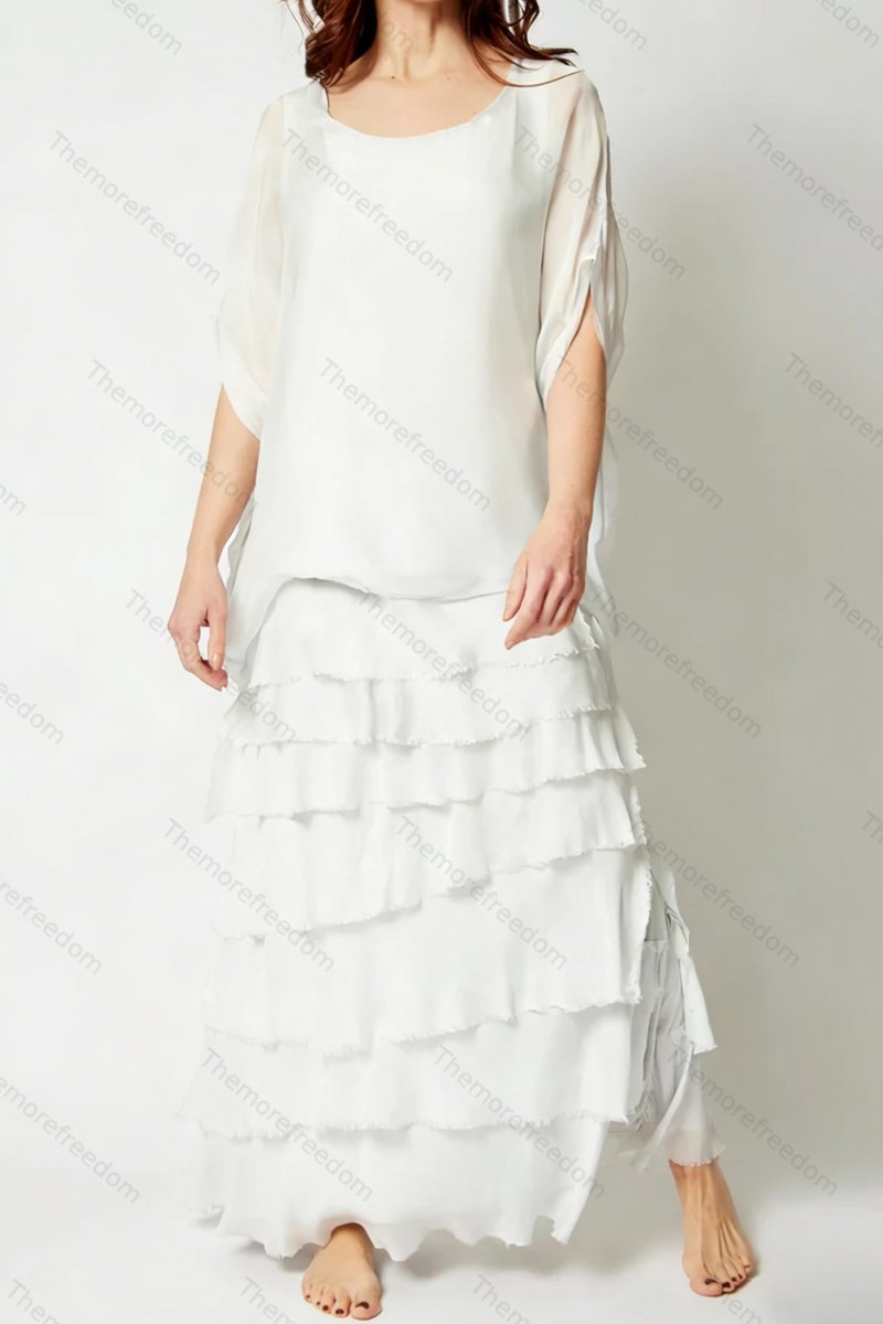 Women's solid color chiffon round neck three-quarter sleeve dress with tassel trim