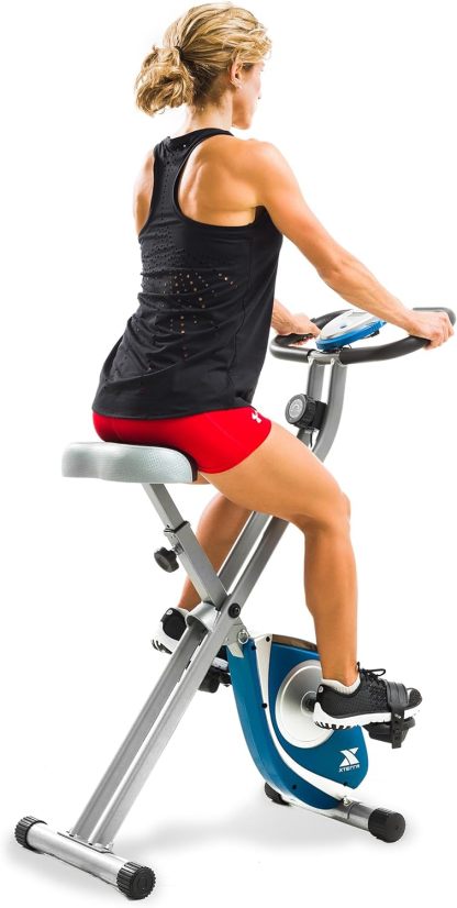 XTERRA Fitness bicicleta estática plegable, capacidad de peso de 220 libras