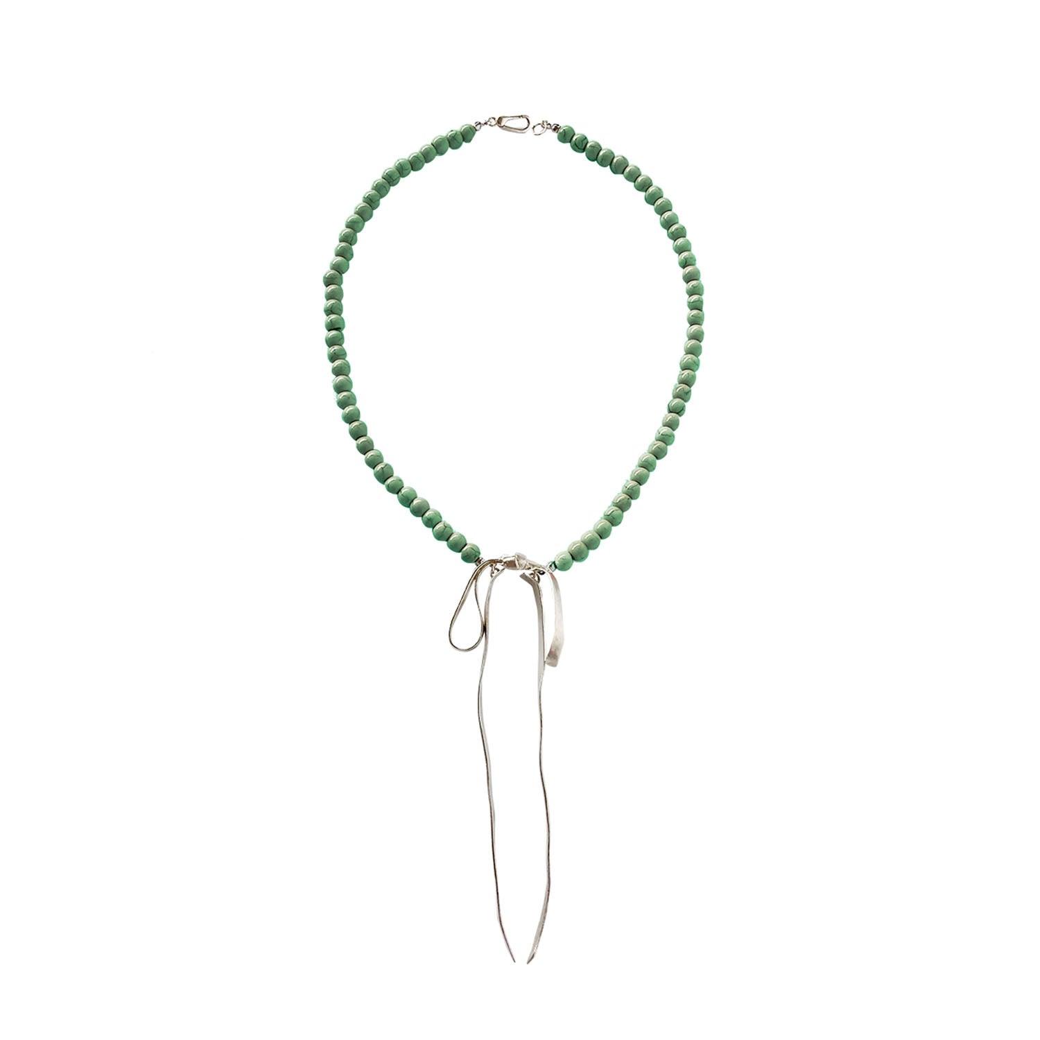 Chloe VINTAGE GREEN BEADED RIBBON NECKLACE featuring a clean chic bow design of Dyed green quartz & Glass beads in small size and vintage green color with gold necklace clasp ,perfect for dailylife/party/office/casual occasion. Styled against a white background.