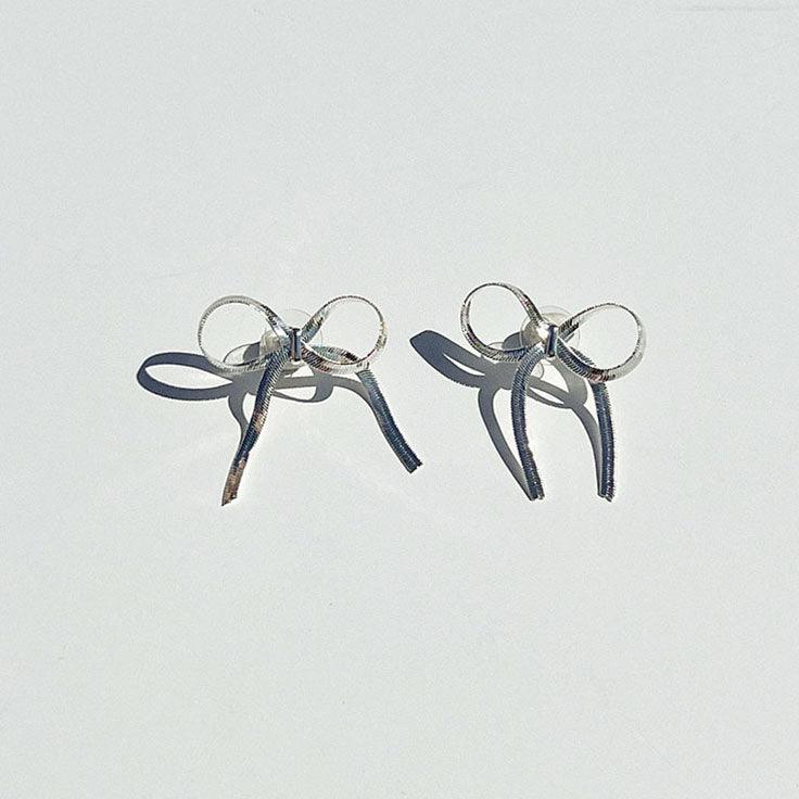 Chloe Lily Gorgeous Silver Bow Earrings - bowsatelier