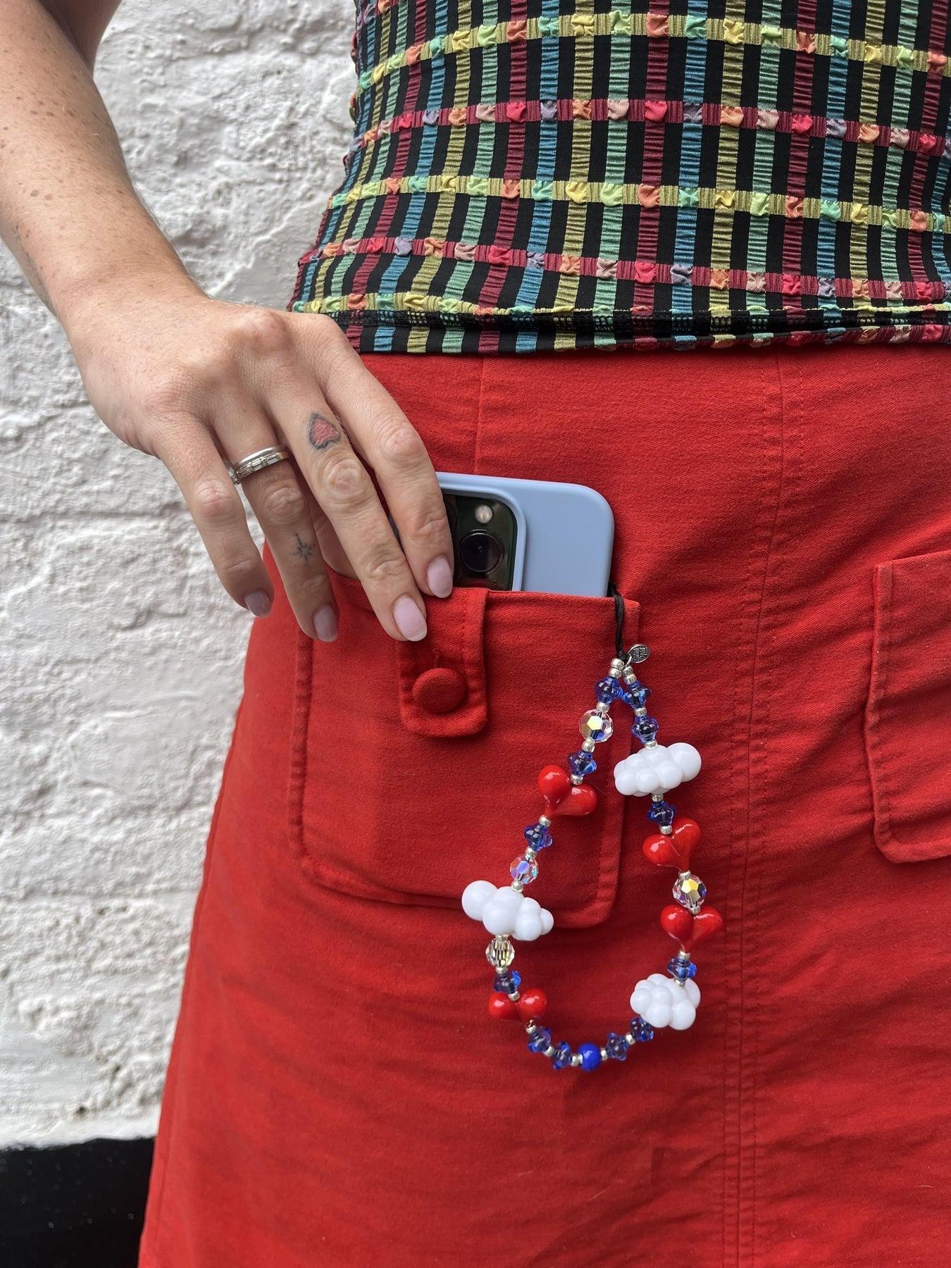 Cupid's Kawaii Wristlet Phone Strap Stringting sale phone charm crafted with high-quality colorful beads—perfect for accessorizing phones with a minimalist, stylish touch. A must-have essential and a thoughtful gift idea for women.