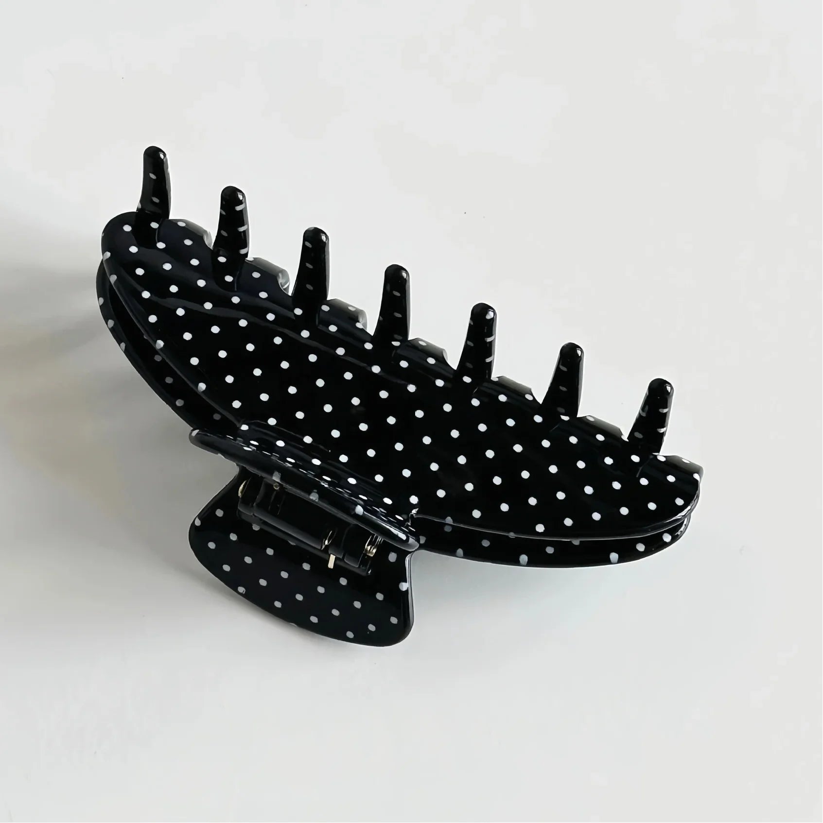Big Effing Clip in Black Polka Dot Black hair clip with white polka dots on a light gray background