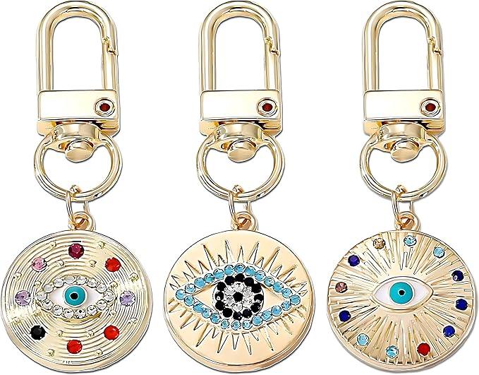 Silver Gold Evil Eye Keychain for Women Protection Good Luck Charms Key Chain for Car Keys Holder Bag Purse featuring a clean chic eye design and gold color ,perfect for daily /party/casual/office bagcharm/chain charm decoration . Styled against a white background.