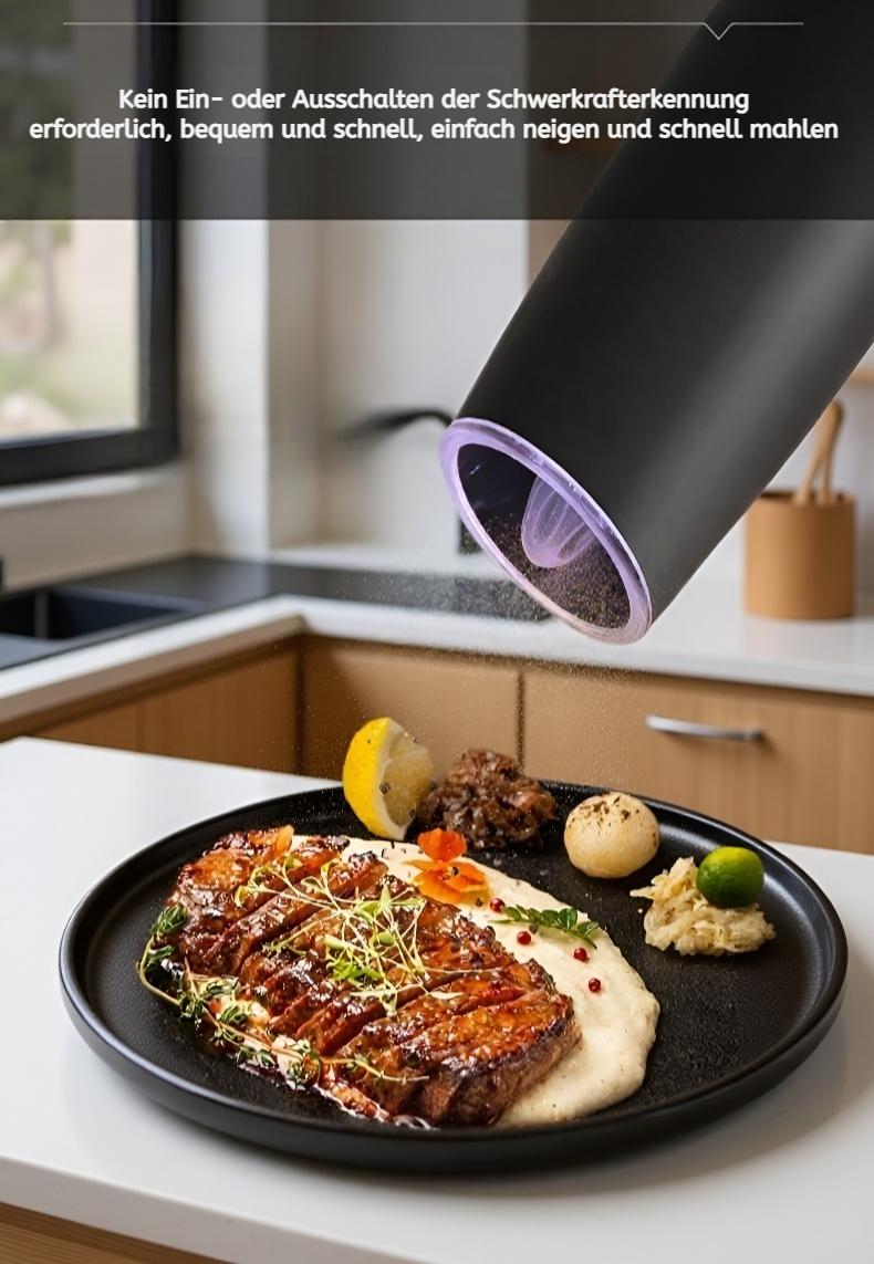 Edelstahl elektrische Pfeffermühle beim Mahlen von Pfeffer