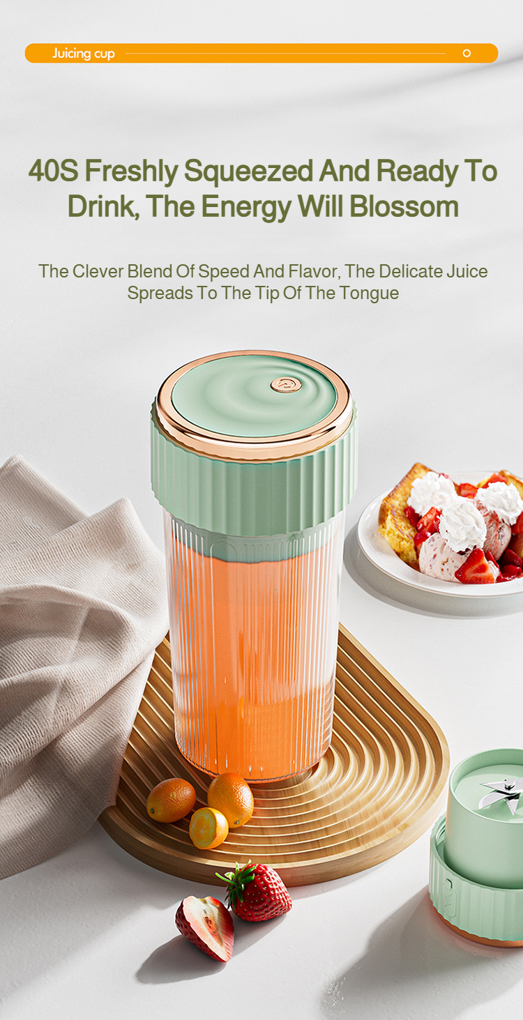 Compact travel juicer cup with lid and strainer