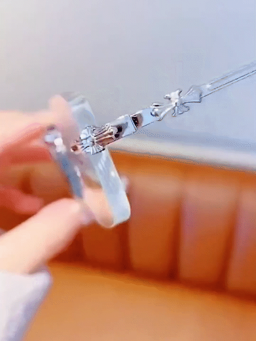 Lightweight rimless design reading glasses on book