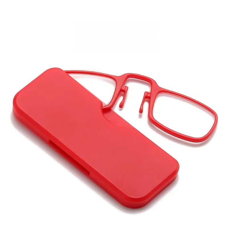 Close-up of reading nose clip on book