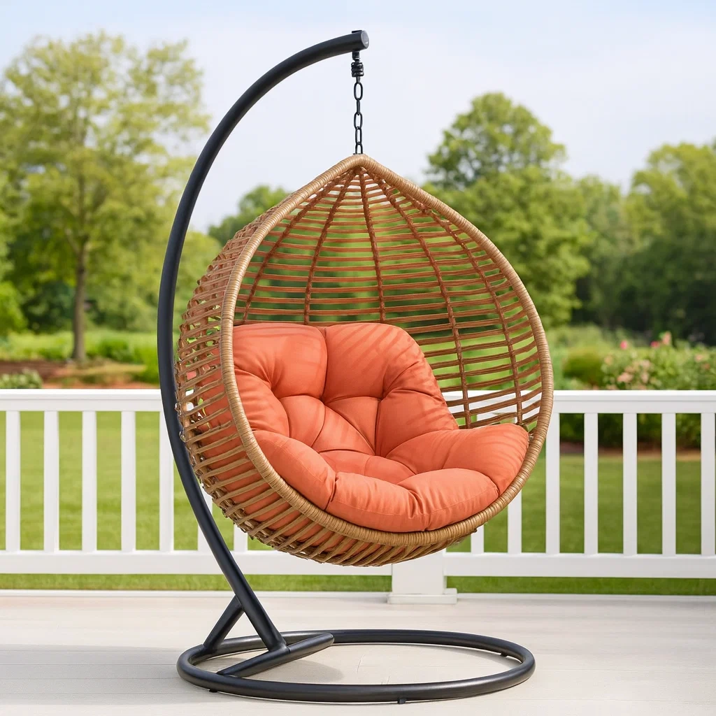 Fauteuil suspendu en forme d'œuf en rotin et acier avec coussin de couleur orange-SOFTFURNIZONE