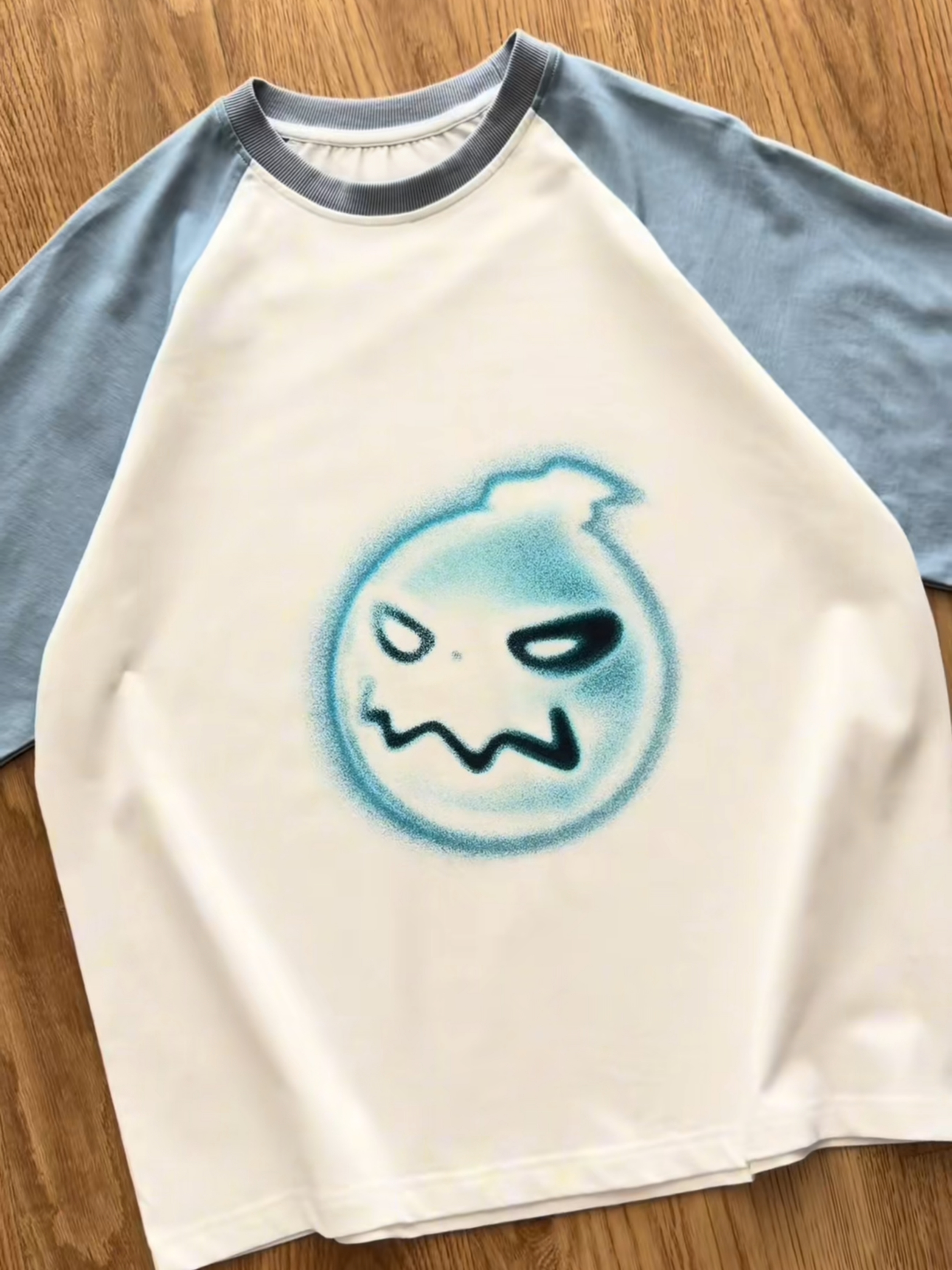 VOID GRIN RAGLAN TEE
