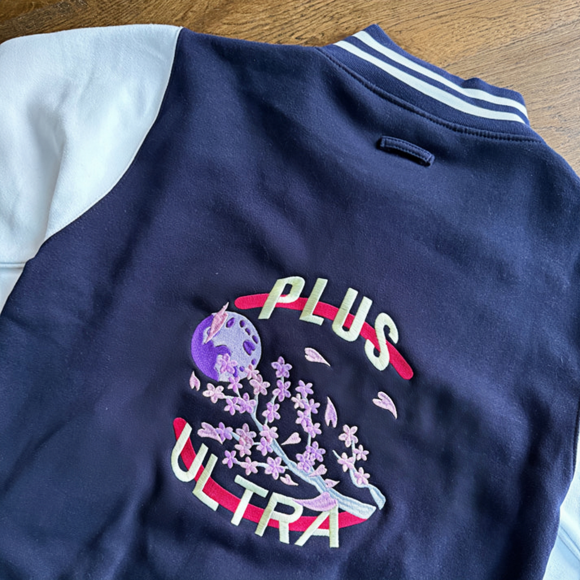 SYMBOL OF PEACE VARSITY JACKET