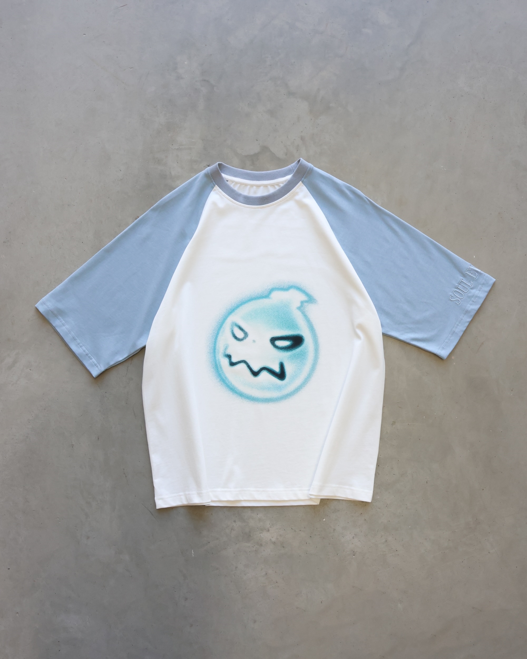 VOID GRIN RAGLAN TEE