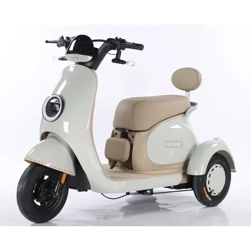 Triciclo eléctrico superventas (categoría de scooters eléctricos): vehículo de tres ruedas con pedales para adultos.