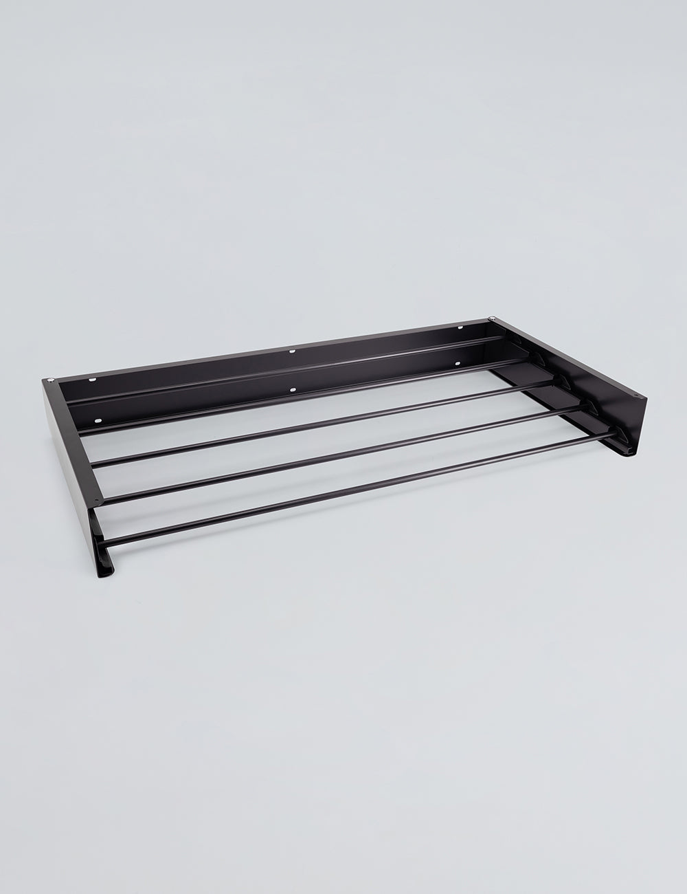 Tendedero de pared plegable para interiores y exteriores.