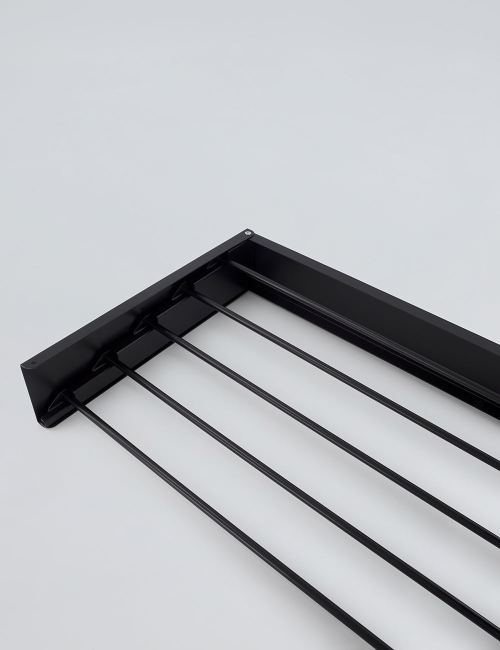 Tendedero de pared plegable para interiores y exteriores.