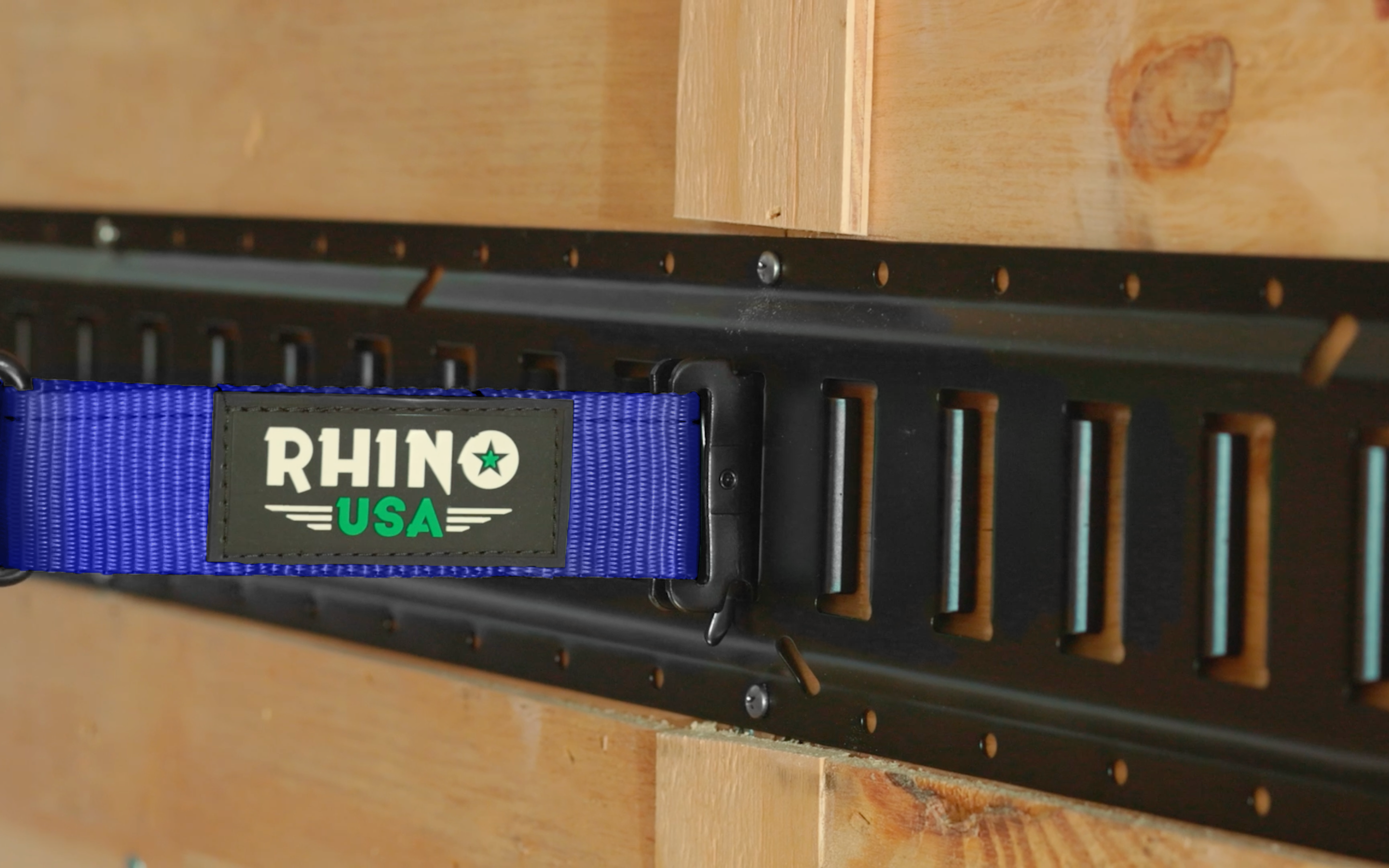 A metal plate with a blue strap attached to it.
