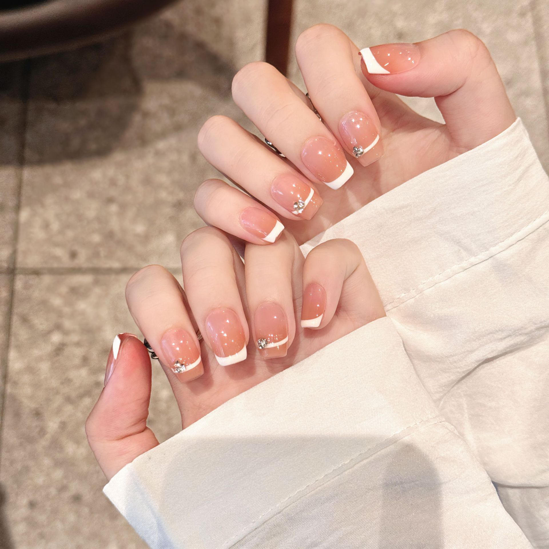 Cherry Whisper: Soft Pink French Nail with Crystal Accents