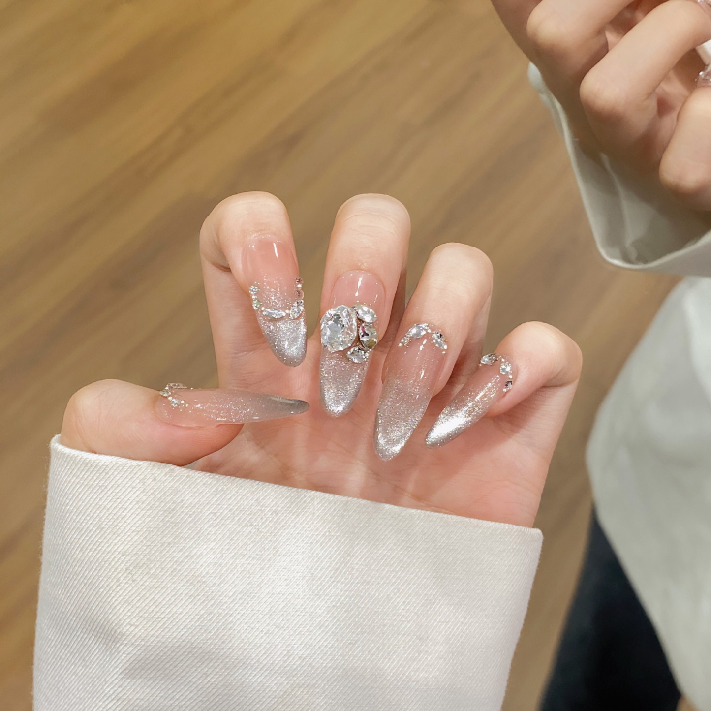 Frosty Starlight: Crystal Bouquet Nail Art