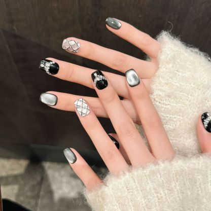 Midnight Brocade: Black & White Grid Crystal Nail Art