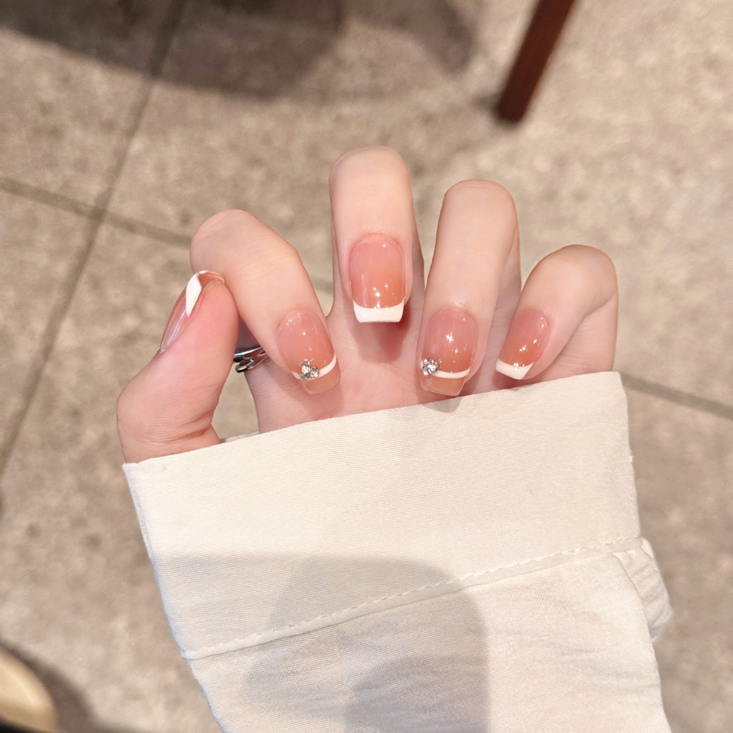 Cherry Whisper: Soft Pink French Nail with Crystal Accents