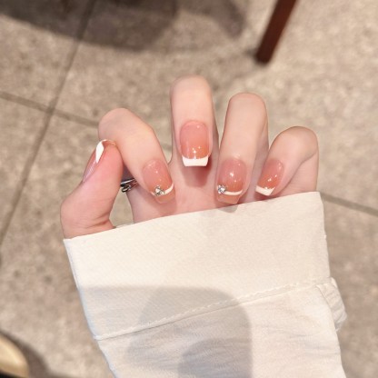 Cherry Whisper: Soft Pink French Nail with Crystal Accents