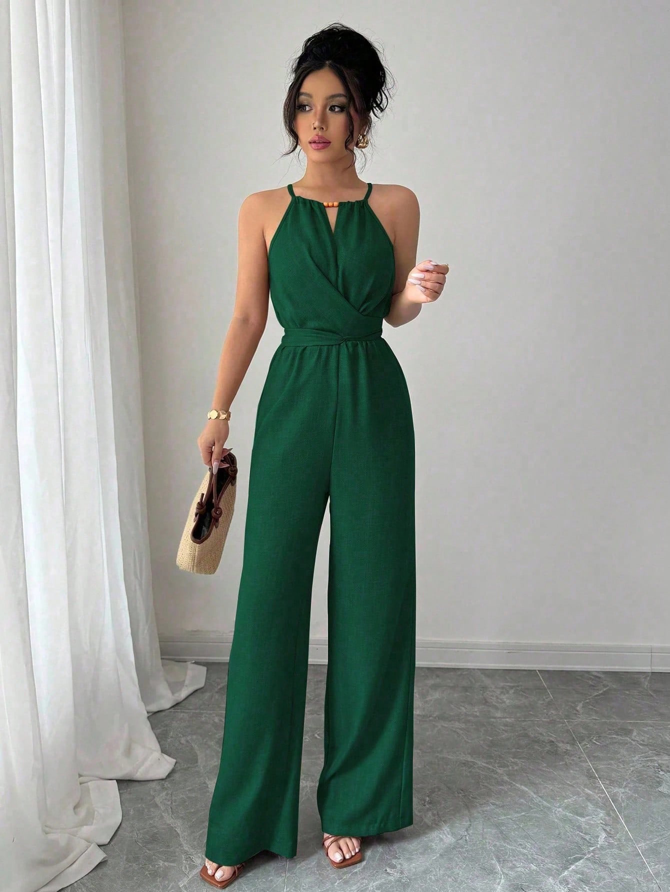 Women's Halter Neck Sleeveless Jumpsuit with Cinched Waist and Flowing Drape