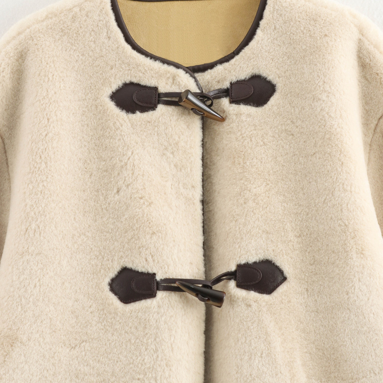 Women's Faux Fur Coat with Knot Button Detail