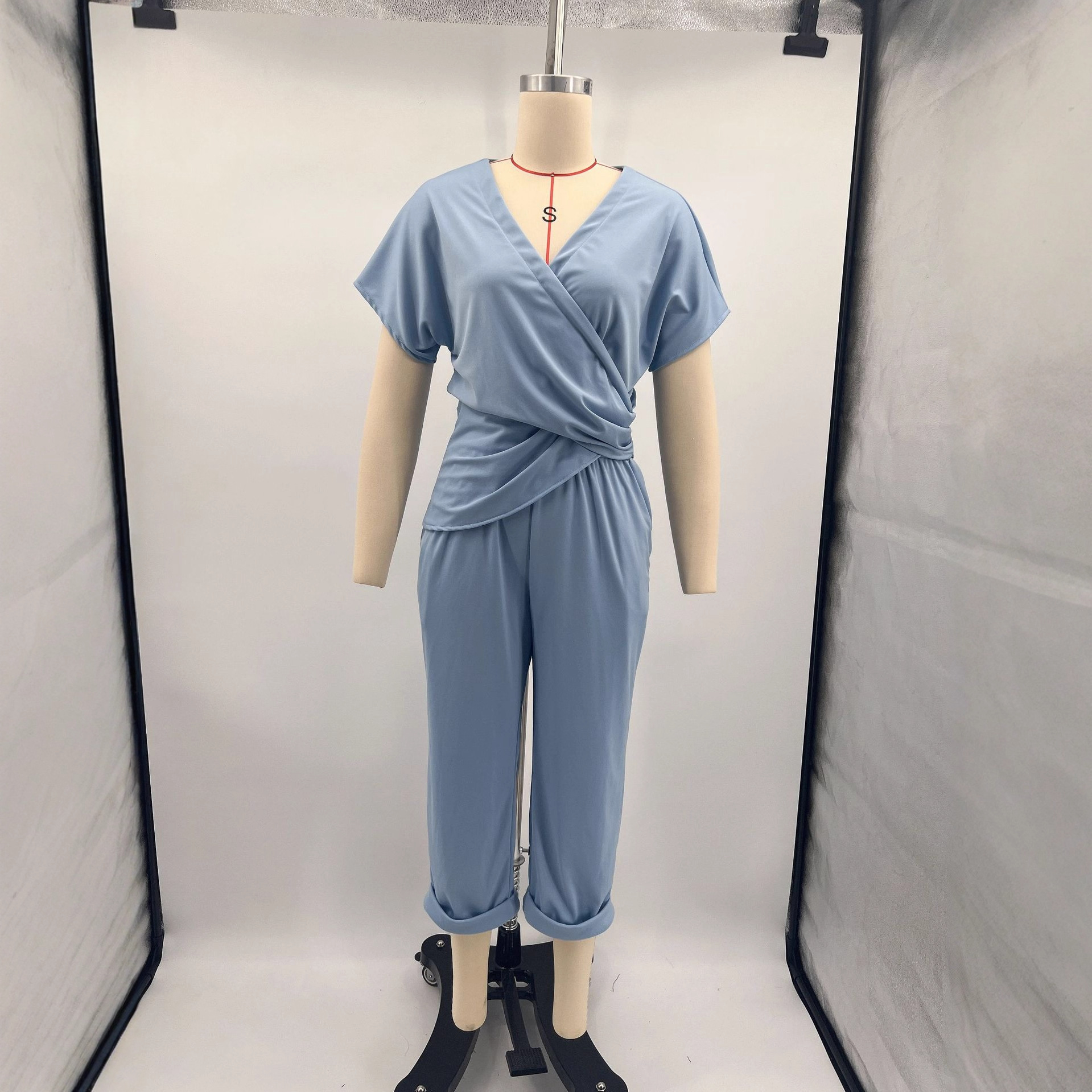 Women's Solid Color Asymmetrical Short Sleeve Two-Piece Pants Set