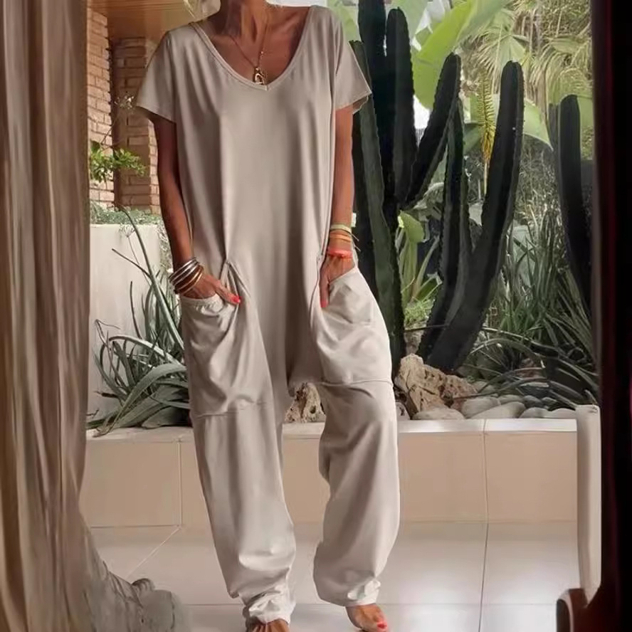 Solid V-Neck Jumpsuit with Oversized Pockets and Low Crotch