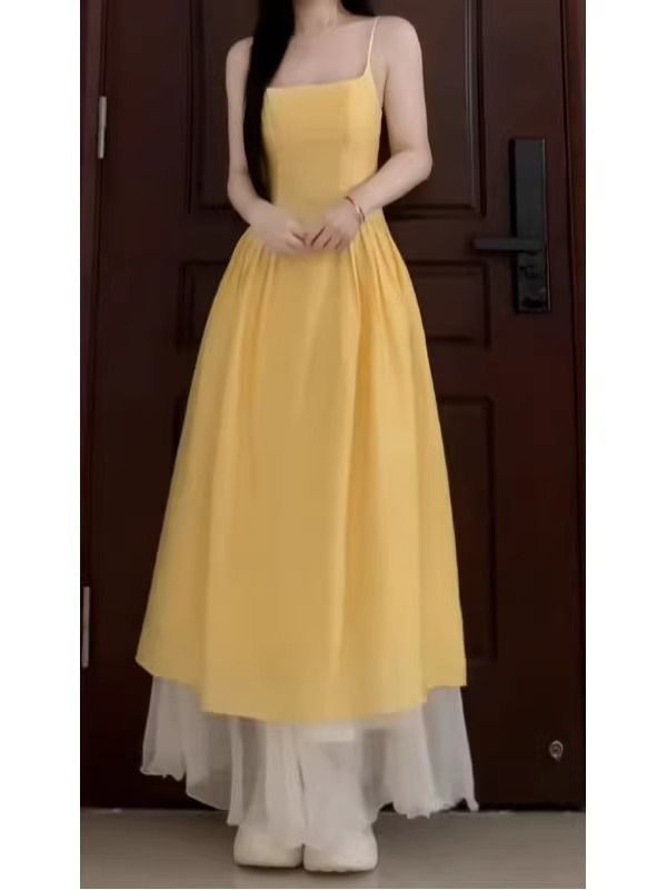 Yellow Sleeveless Midi Dress with Cinched Waist