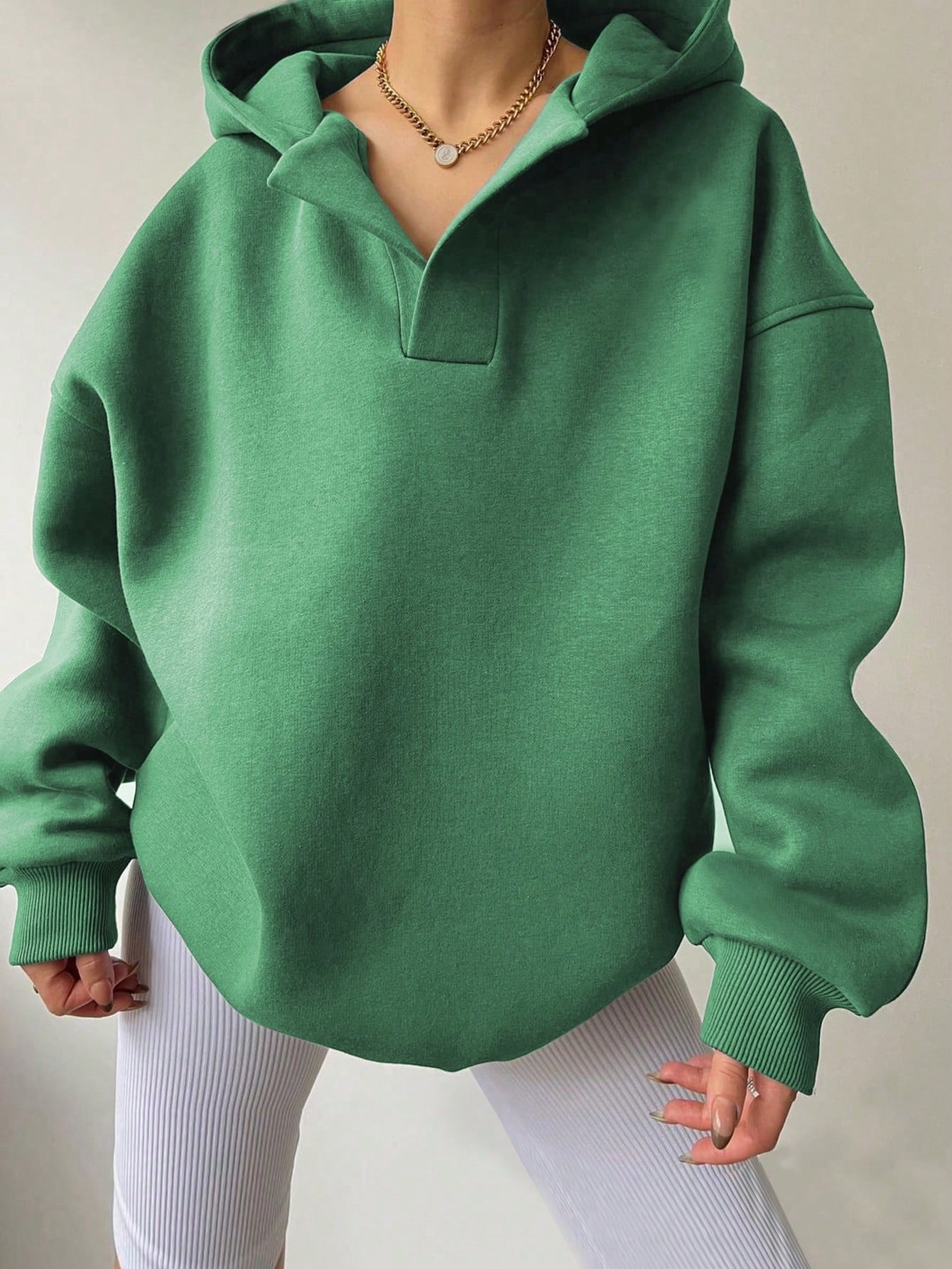 Fleece-Lined Hooded Sweatshirt with Ribbed Cuffs and Solid Color Design