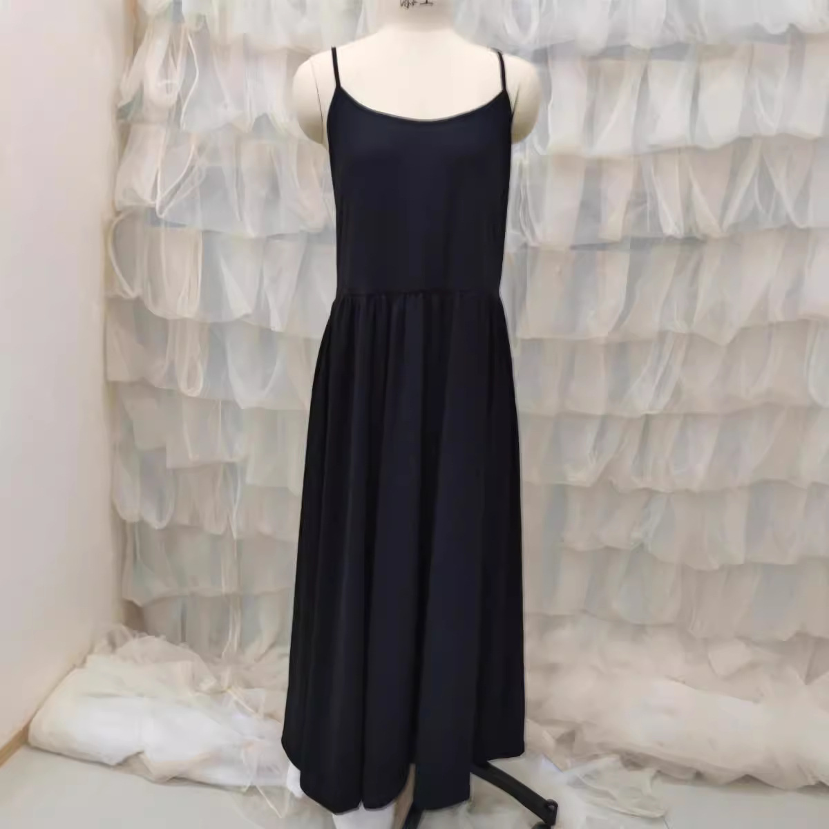 Elegant Sleeveless Midi Dress with Open Back and Spaghetti Straps