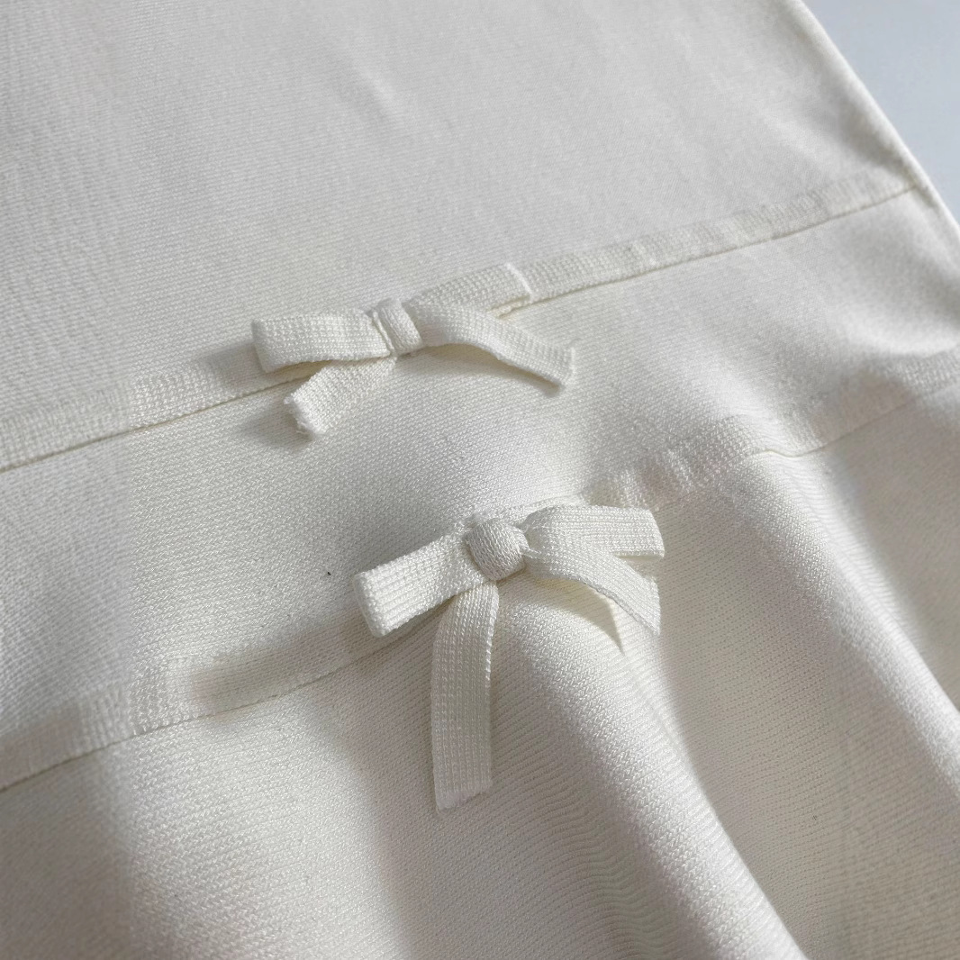 Women's Sleeveless Knit Top with Bow Detail