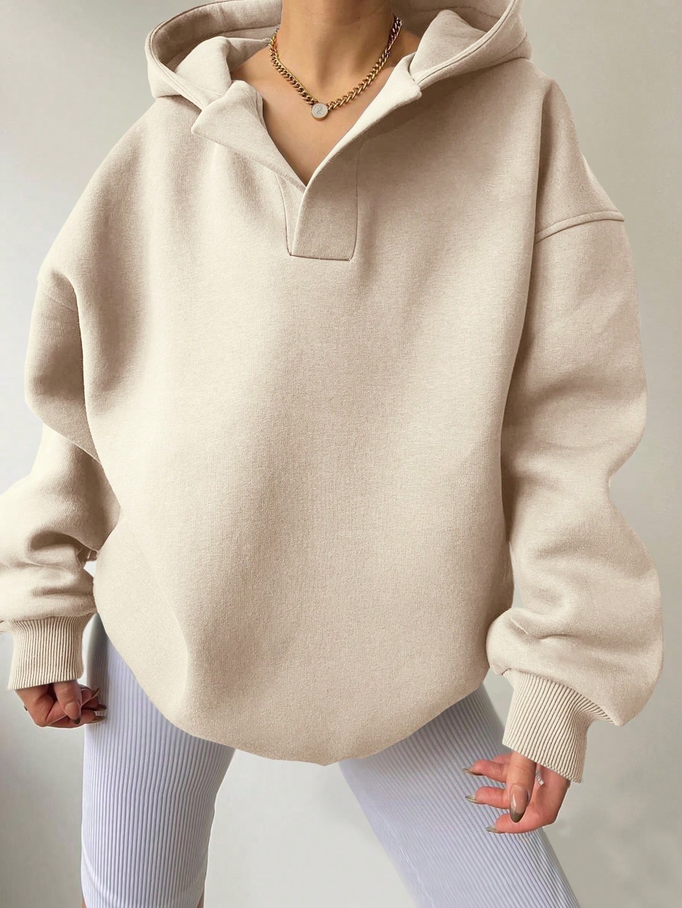 Fleece-Lined Hooded Sweatshirt with Ribbed Cuffs and Solid Color Design
