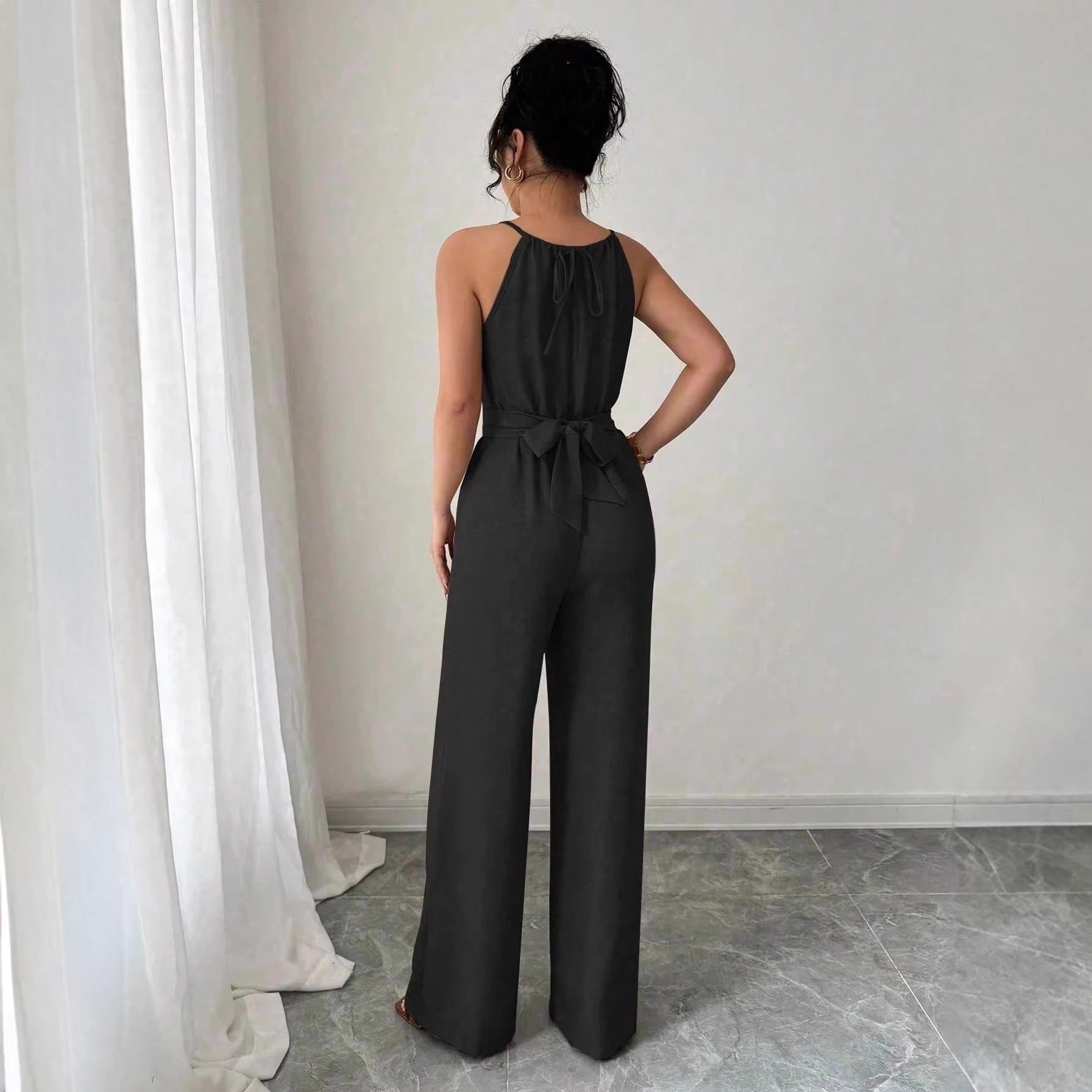 Women's Halter Neck Sleeveless Jumpsuit with Cinched Waist and Flowing Drape