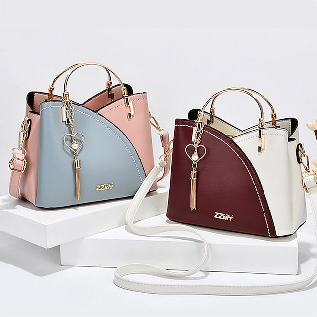 Women's Navy Blue and Pink Handbag with Heart Tassel Charm – Elegant Faux Leather Crossbody and Tote Bag for Everyday Use