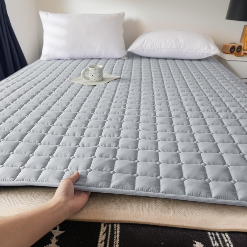 Anti-slip soft mattress topper in bedroom