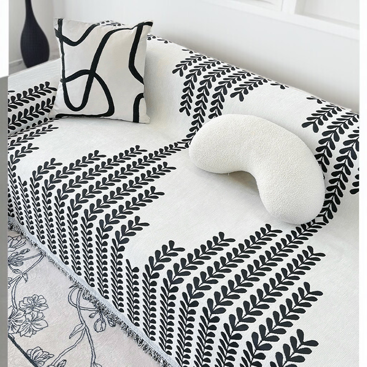 Decorative non-skidding towel on beige sofa