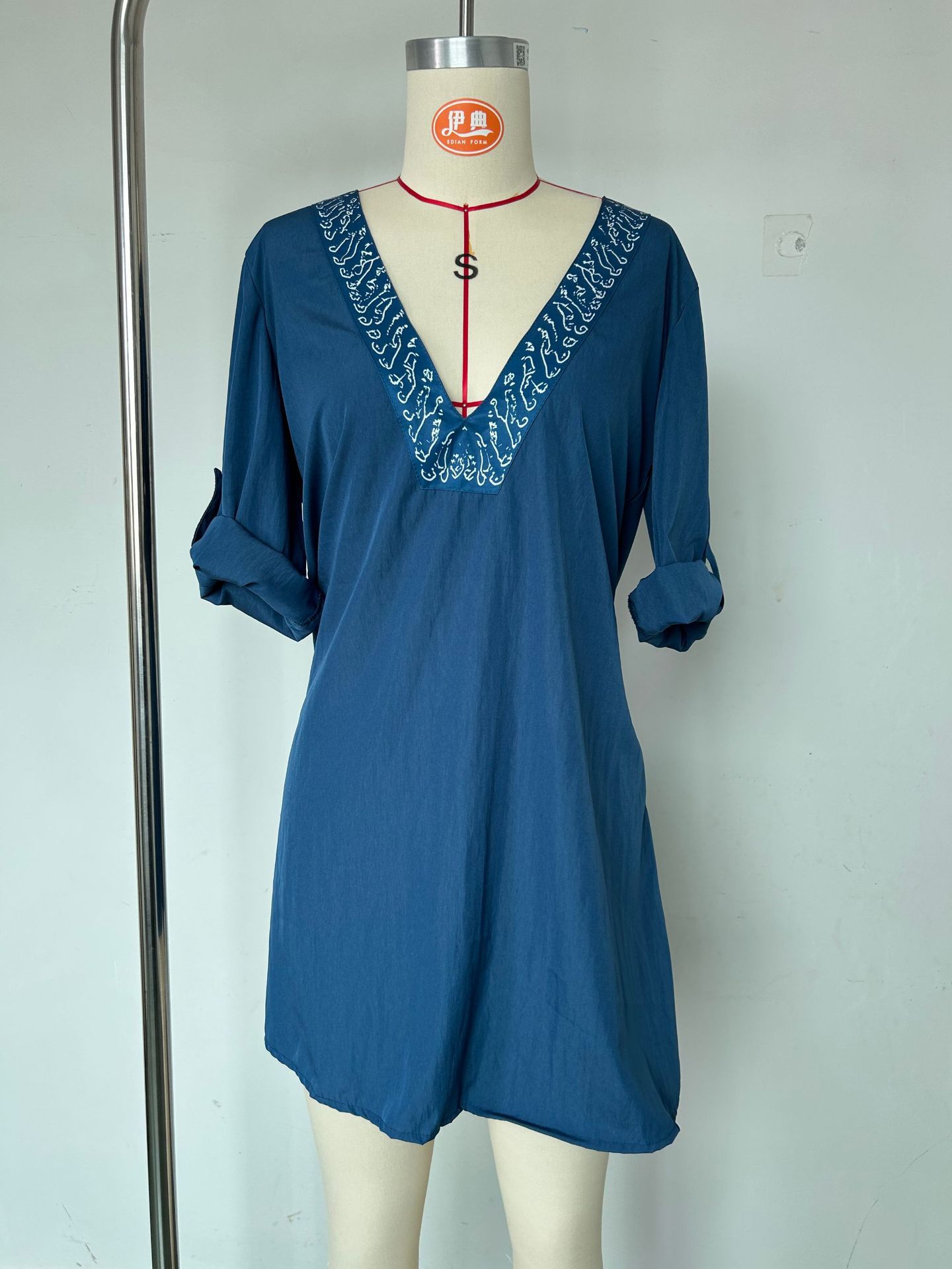Pleated V-neck maxi dress, model wearing lifestyle photo showing elegant slim fit