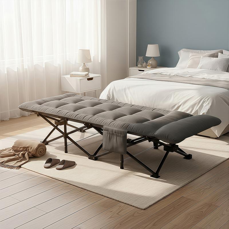 Cama Plegable Extra Grande Gris de 65*180 Cm para Exteriores – Portátil para Camping, Estadios, Viajes y Oficina. Estructura de Metal Resistente con Bolsillos Laterales de Almacenamiento.