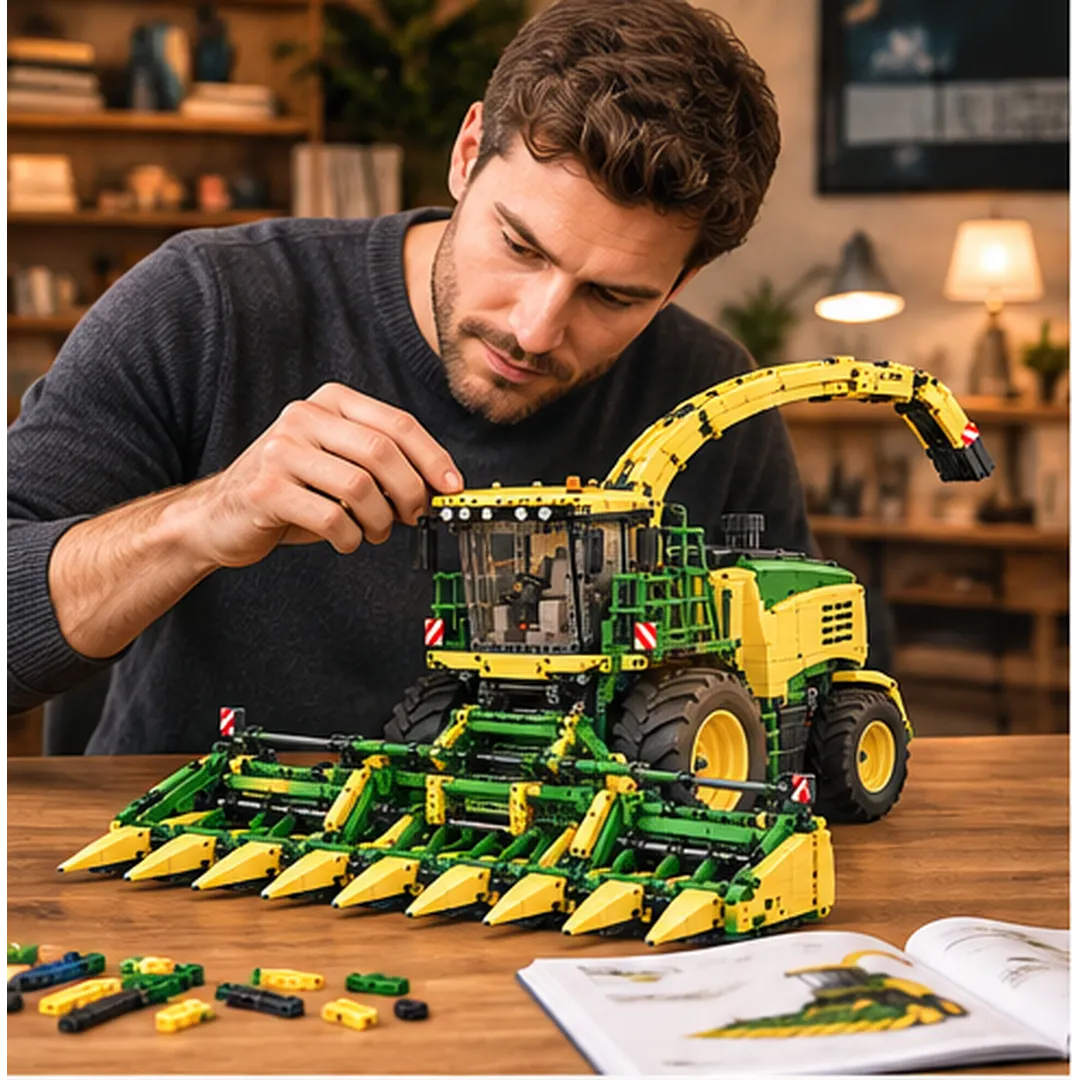 Adult hobbyist assembling a green and yellow forage harvester building-brick model at a wooden table with loose pieces and an illustrated booklet
