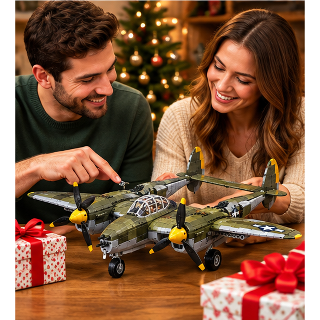 Couple enjoying an olive-green twin-boom fighter collector building model beside holiday presents