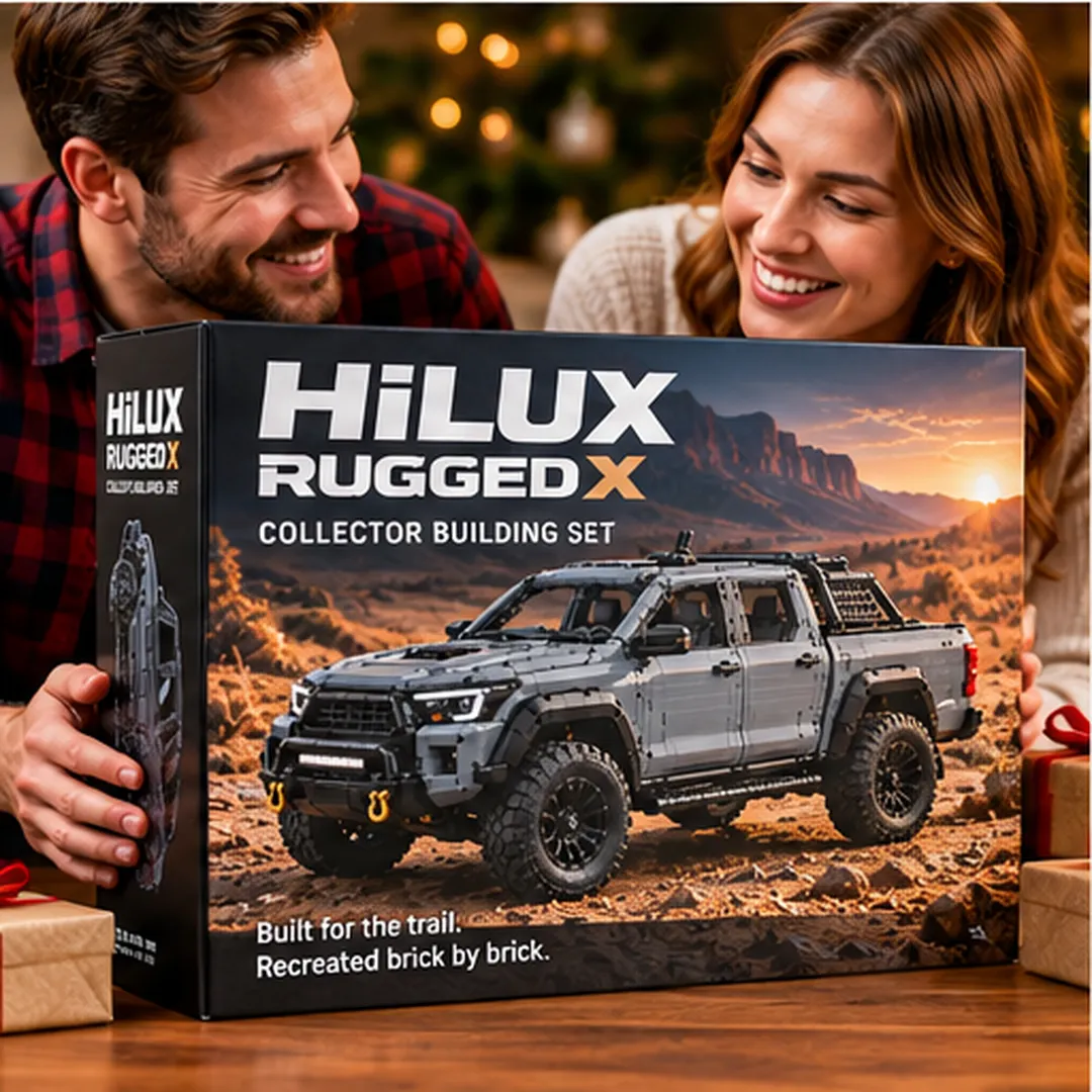 Adult enthusiast assembling the off-road pickup building set with bricks and instructions