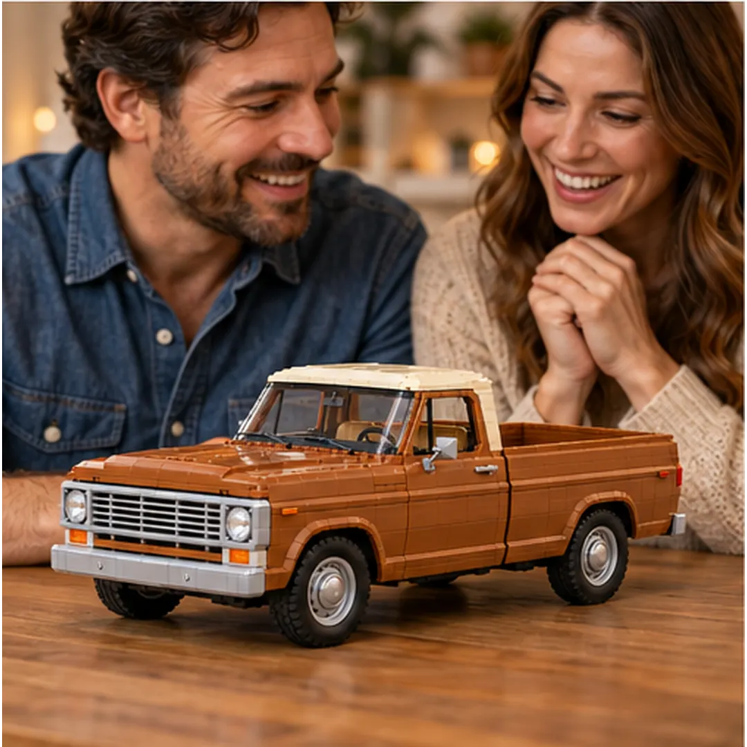 Two adults smiling as they admire the completed brown and cream vintage pickup brick building set on a wooden table