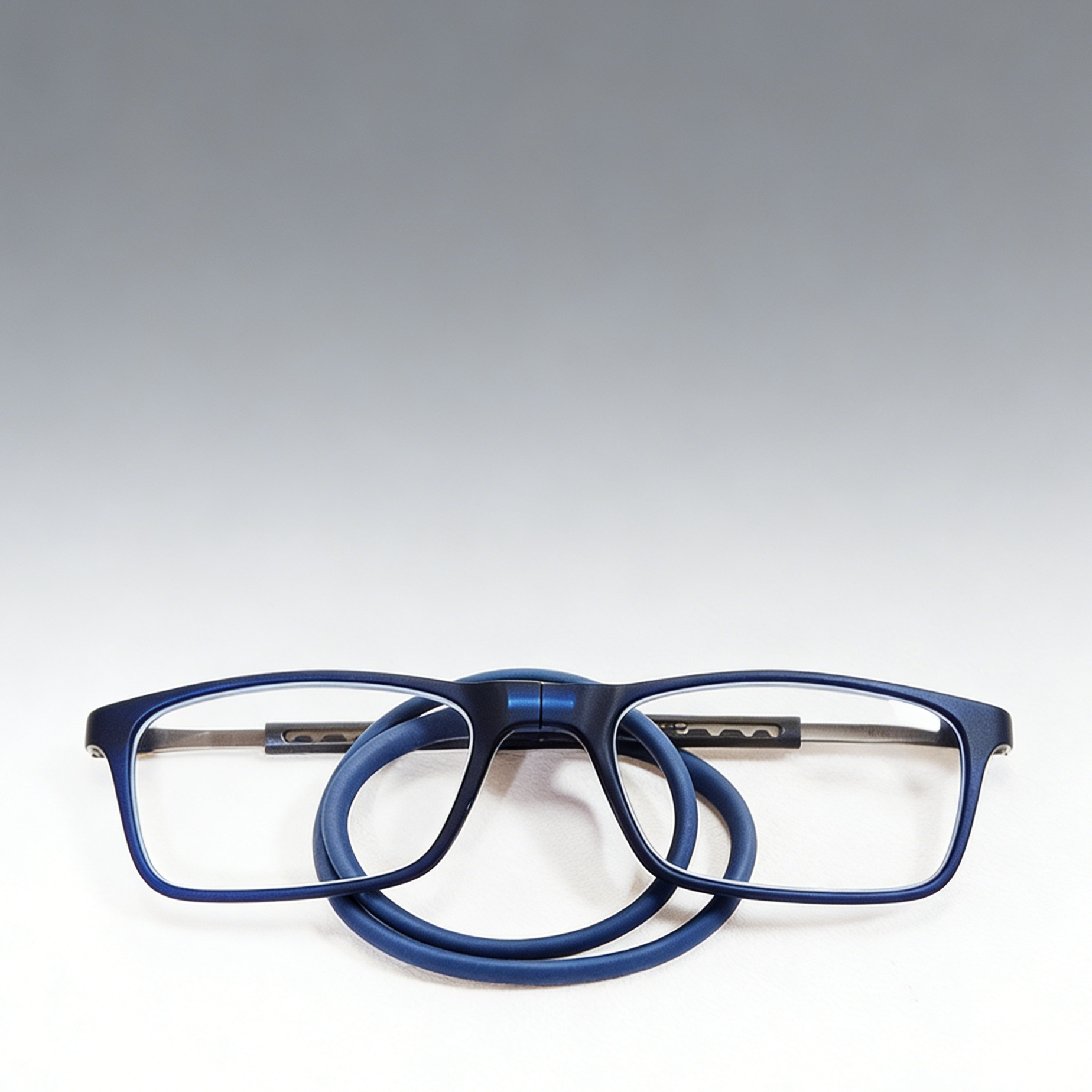 Portable magnetic reading glasses with hanging ropes
