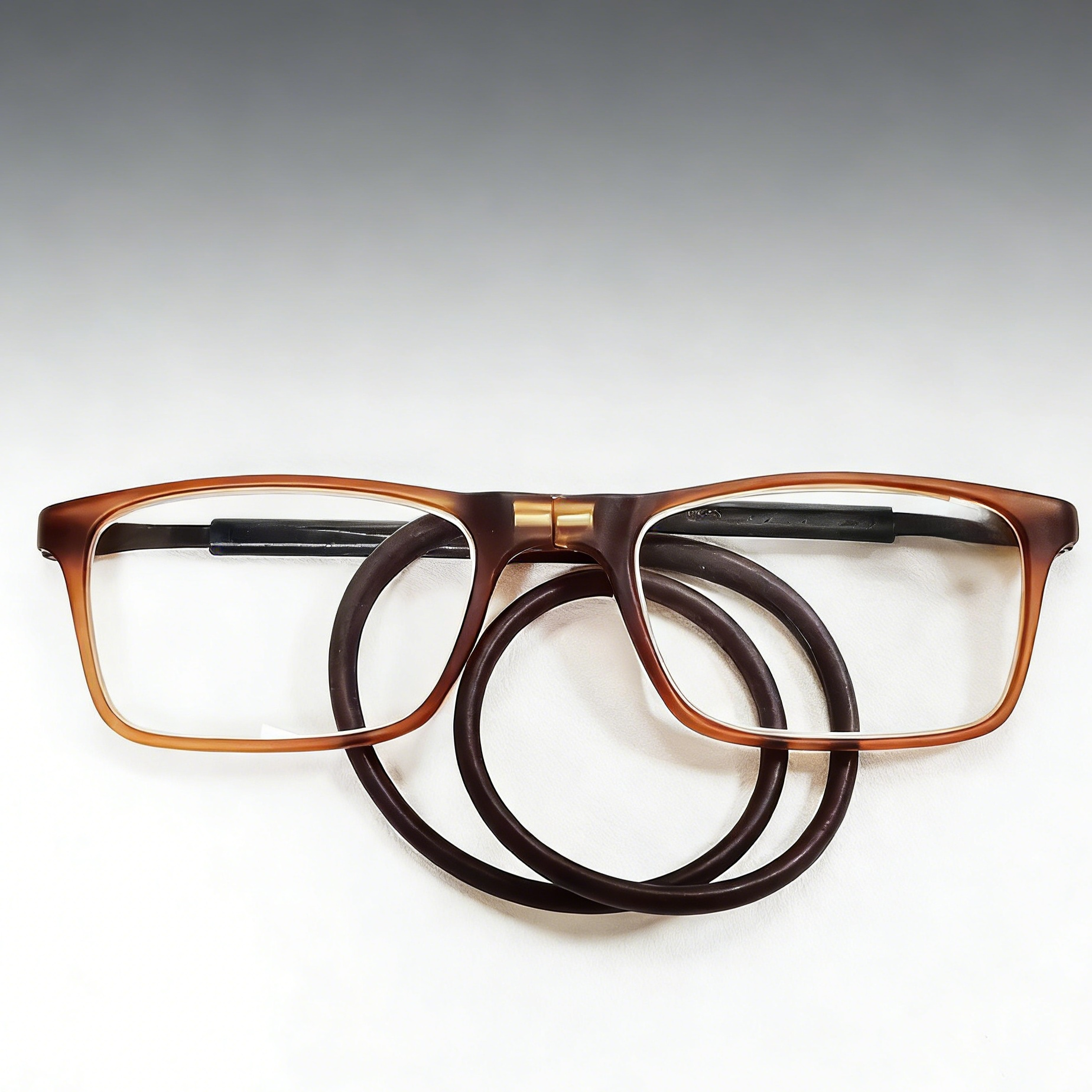 Portable magnetic reading glasses with hanging ropes