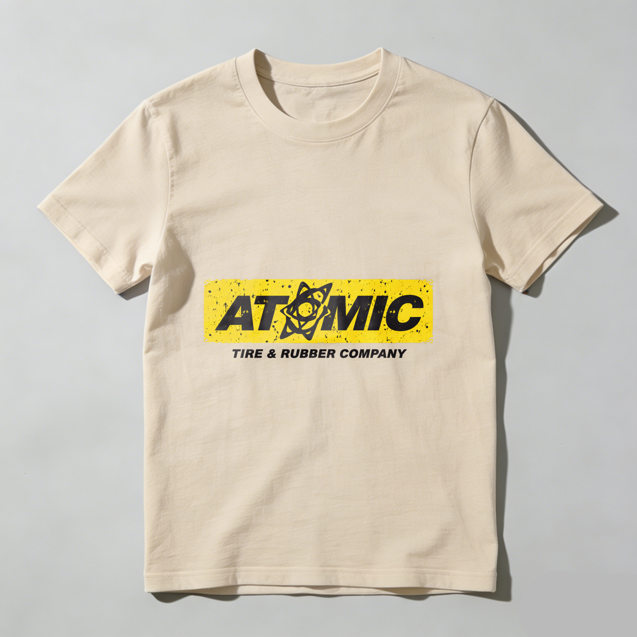 Atomic Tire Rubber Company Black T Shirt With Yellow Logo Design