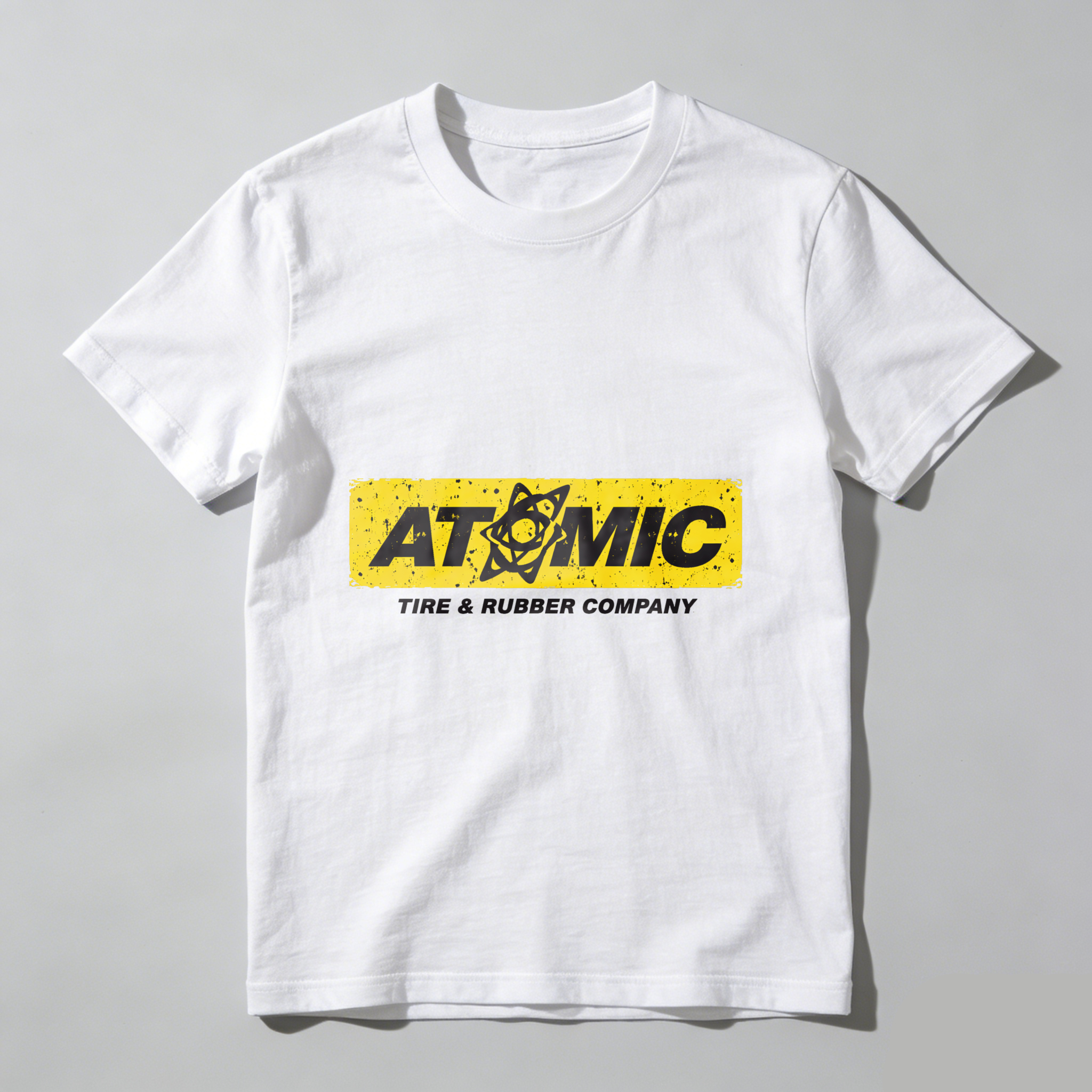 Atomic Tire Rubber Company Black T Shirt With Yellow Logo Design