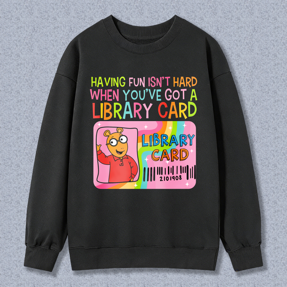 Wardrobecart Having Fun Isn't Hard When You've Got A Library Card With Cartoon Character And Rainbow Design Unisex Classic Sweatshirt